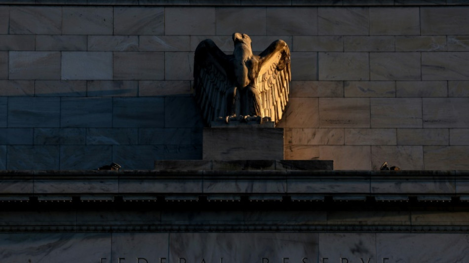 Stock markets waver before Fed decision 