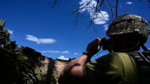 In east Ukraine trench, soldiers dig in for 'total war'