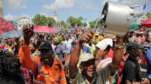 After rioting, Suriname leader appeals for return to normalcy