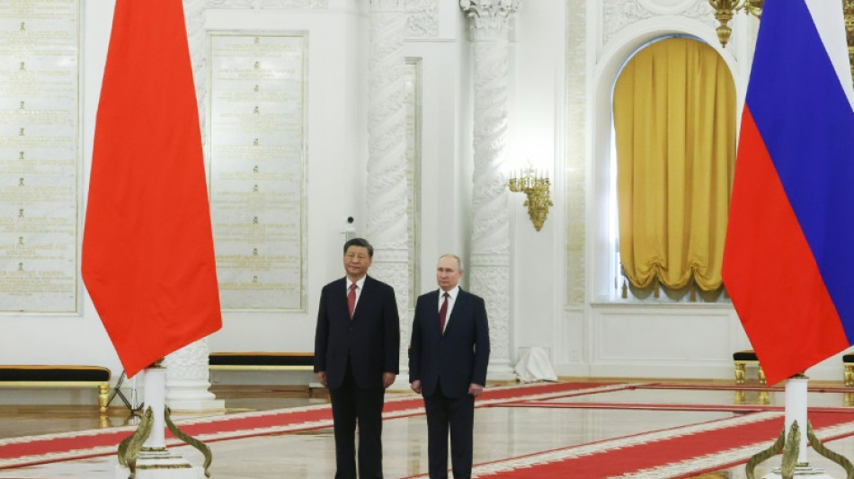 Xi seeks tighter cooperation with Russia at Kremlin talks