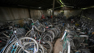 In Ukraine's south, bicycles wait for their owners' return