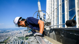 South Korea's skyscraper window cleaner with a fear of heights