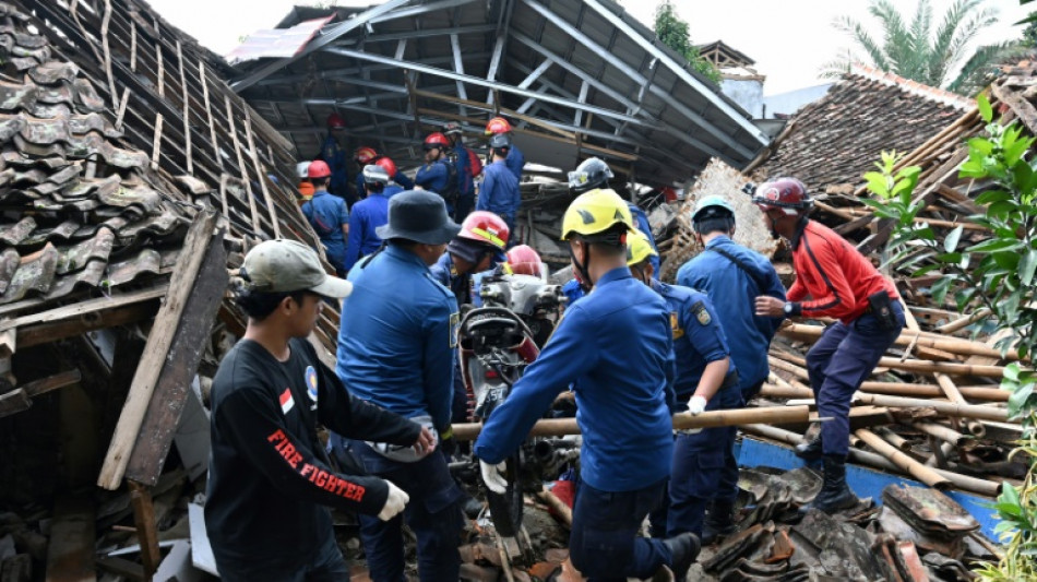 Indonesian girl, 7, found dead after day-long quake rescue effort