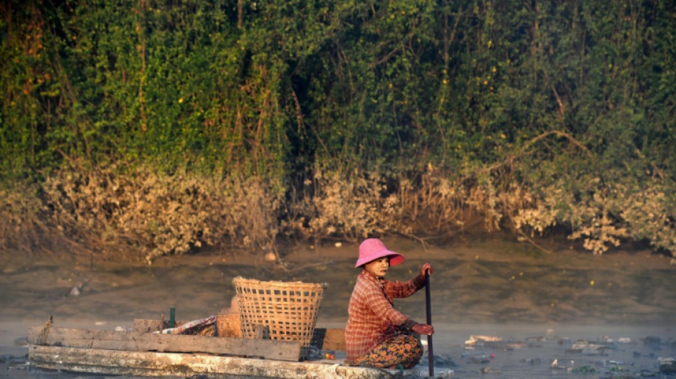 On the water with Myanmar's 'river cleaners'