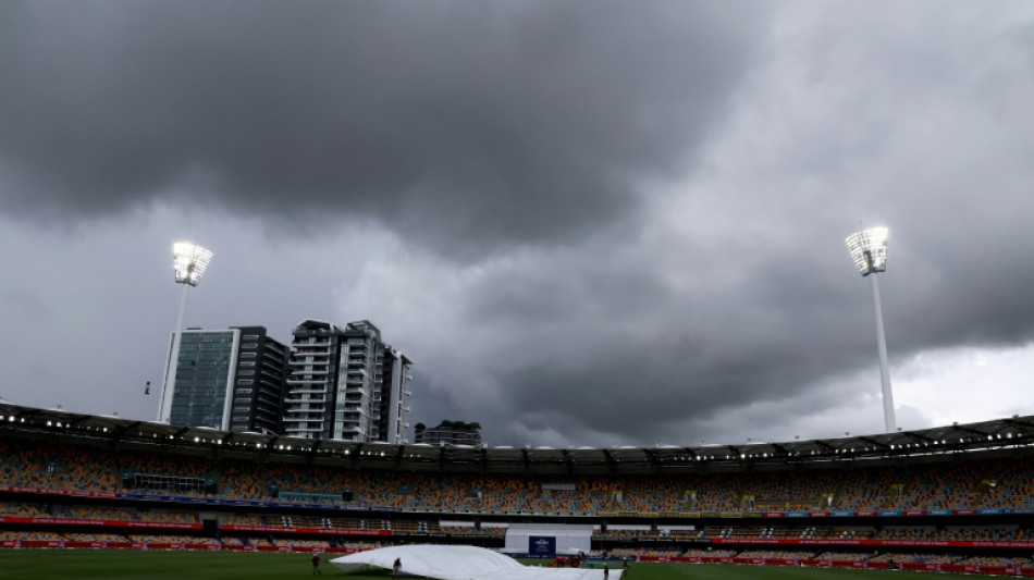 Storms halt Australia's unlikely tilt at victory over India