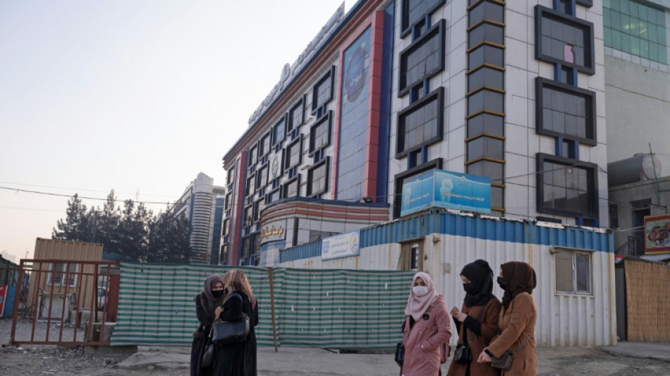 'Hugs, screams and cries': Afghan women anguished at university ban