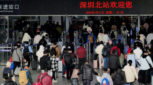 Tens of millions head home for China holidays as Xi flags Covid worry