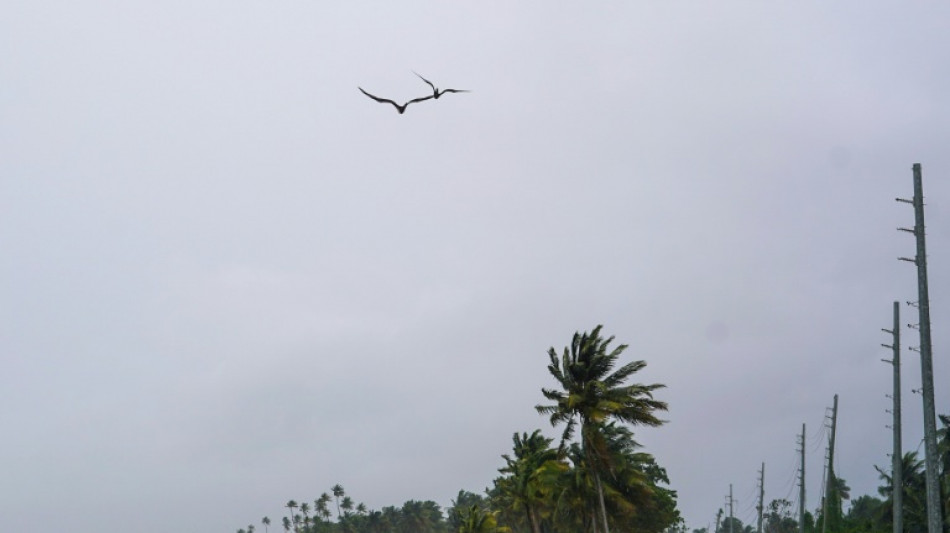 Ernesto becomes a hurricane after drenching Puerto Rico