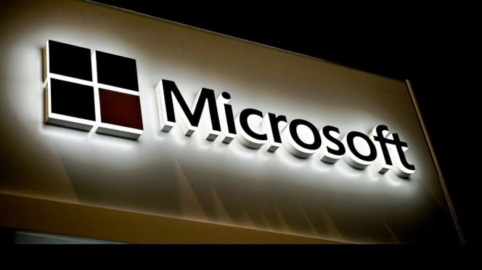 Strong Microsoft results lift Nasdaq as most global bourses fall