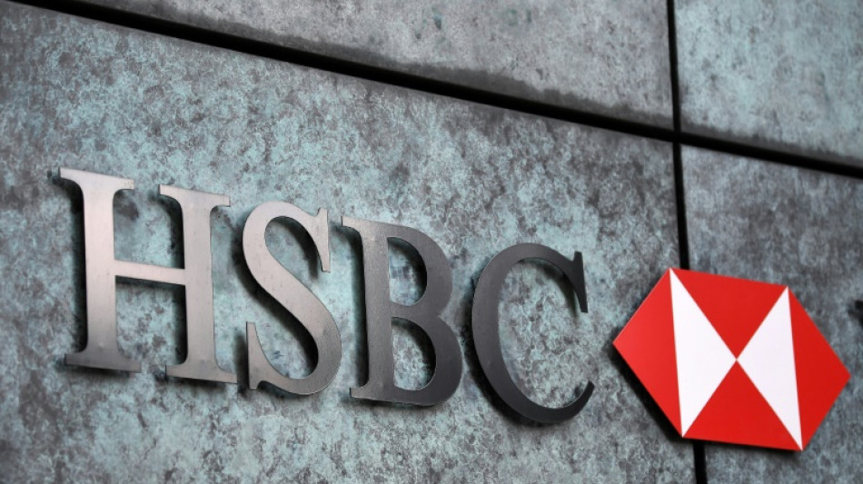 HSBC profits slide on bank impairment charges