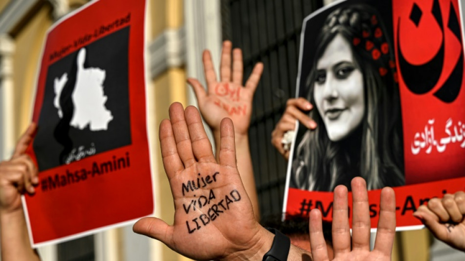 Tear gas fired as Iranians rally over Mahsa Amini's death