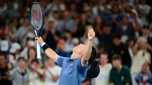 Nishikori rolls back the years in five-set Melbourne epic