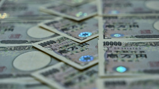 Yen rallies after Bank of Japan policy tweak, Asian equities mixed