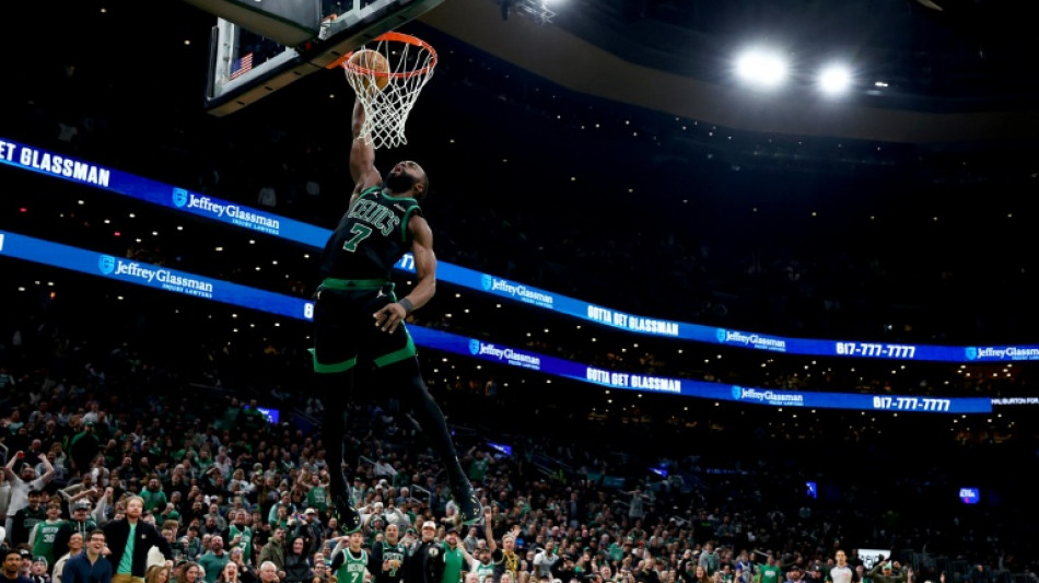 Brown dominates as NBA champion Celtics snap skid