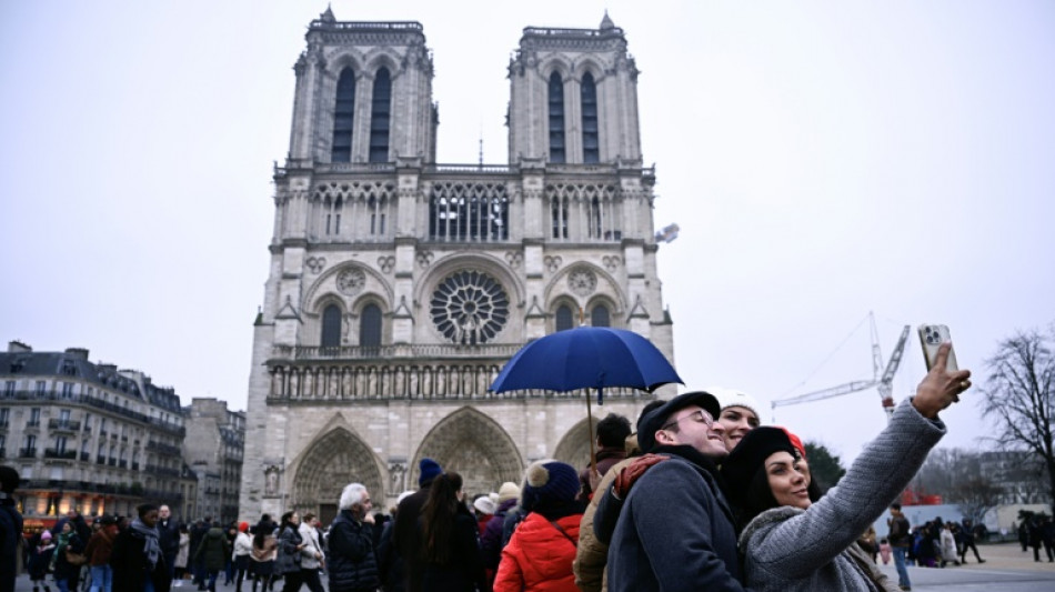 Tourists return to post-Olympic Paris for holiday magic