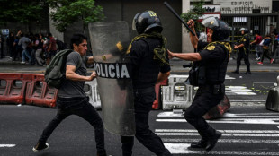 One dead in Peru as protests spread against new president