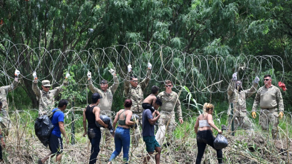 US-Mexico border calm as new asylum rules take effect