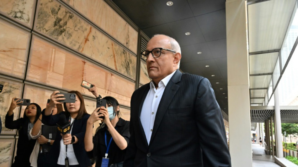 Rare corruption trial of Singapore ex-minister begins