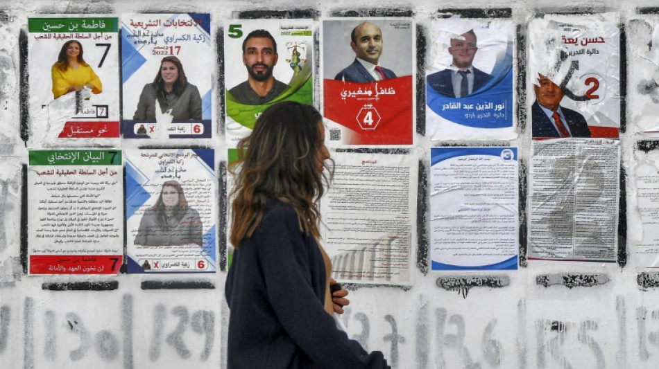 Tunisia awaits languid election for powerless parliament