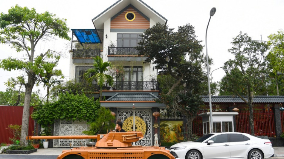 Vietnamese dad spends thousands converting van into wooden tank for son