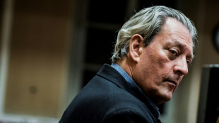 Novelist Paul Auster addresses US gun violence in new book 