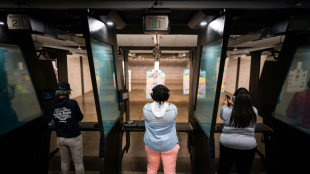 At a US shooting range, more women pull the trigger