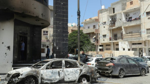 Rival Libya leaders trade blame after Tripoli clashes kill 32