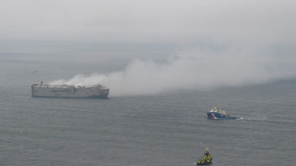 Blazing cargo ship off Netherlands to be towed, 'likely this weekend'