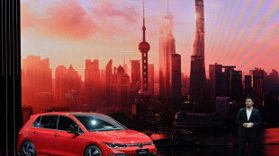 Volkswagen profits dip as it struggles in China