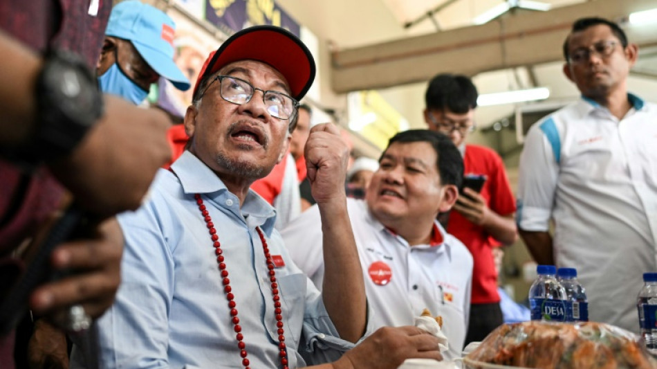 Malaysians vote in tightly contested election