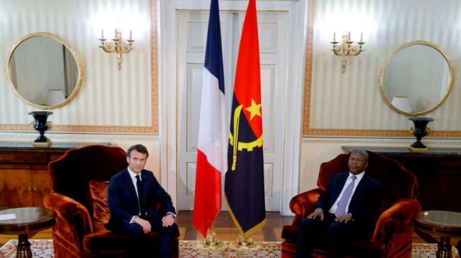 France's Macron pushes economic ties in Angola 