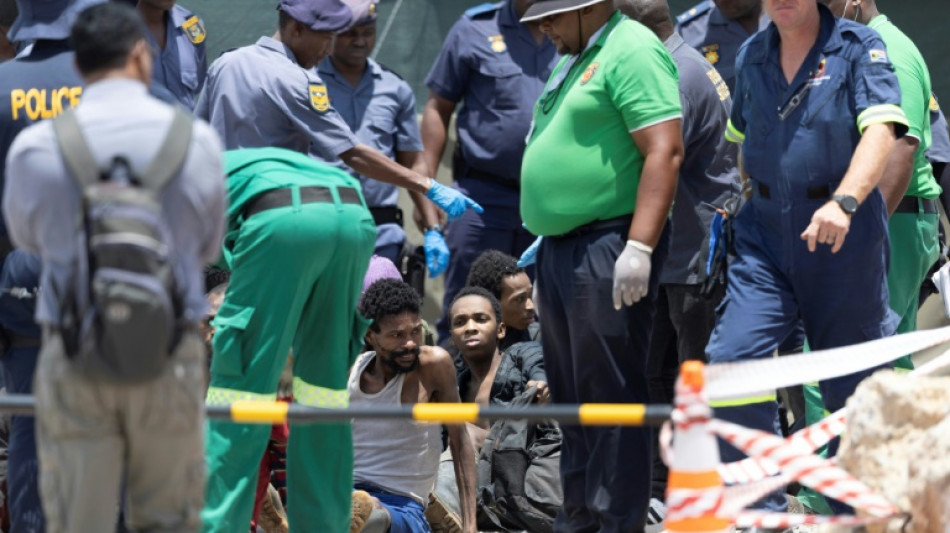 Dozens rescued, 15 bodies pulled from South Africa mine