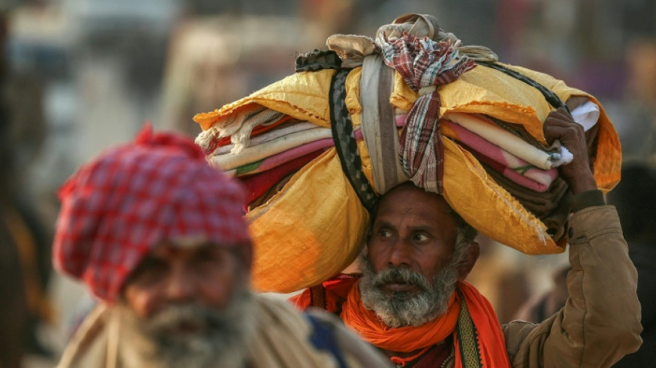 Indian Hindu pilgrims take the plunge ahead of largest gathering