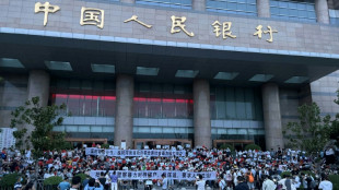 China banks to repay more customers after protests