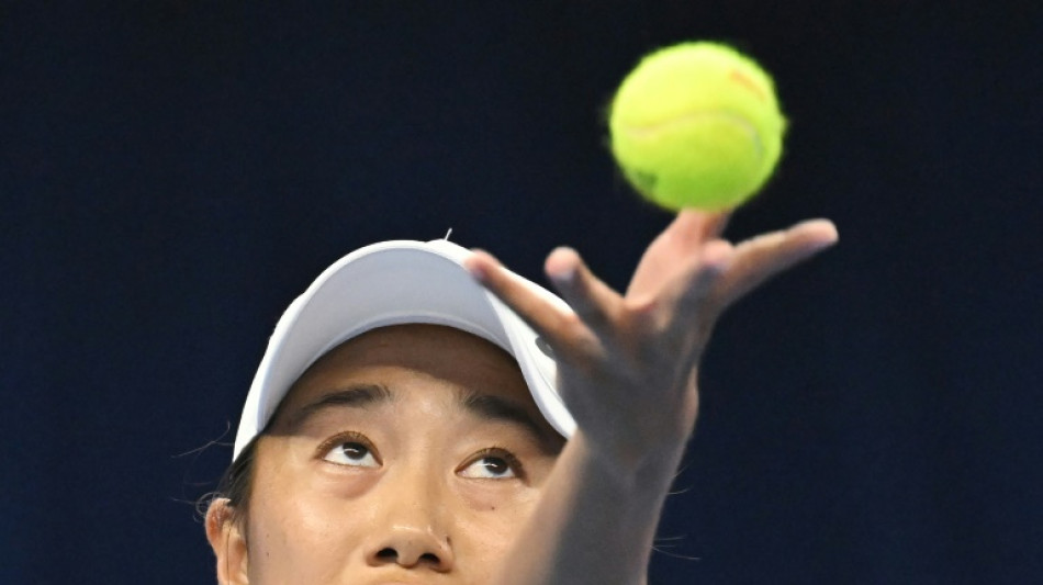 Defiant history-maker Zhang Shuai powers into Beijing last eight