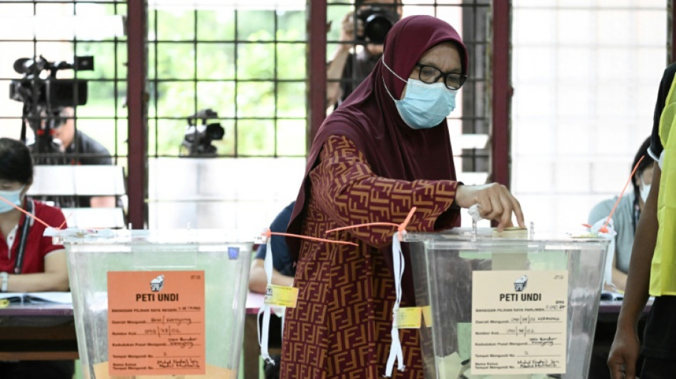 Malaysia election under way with race too close to call