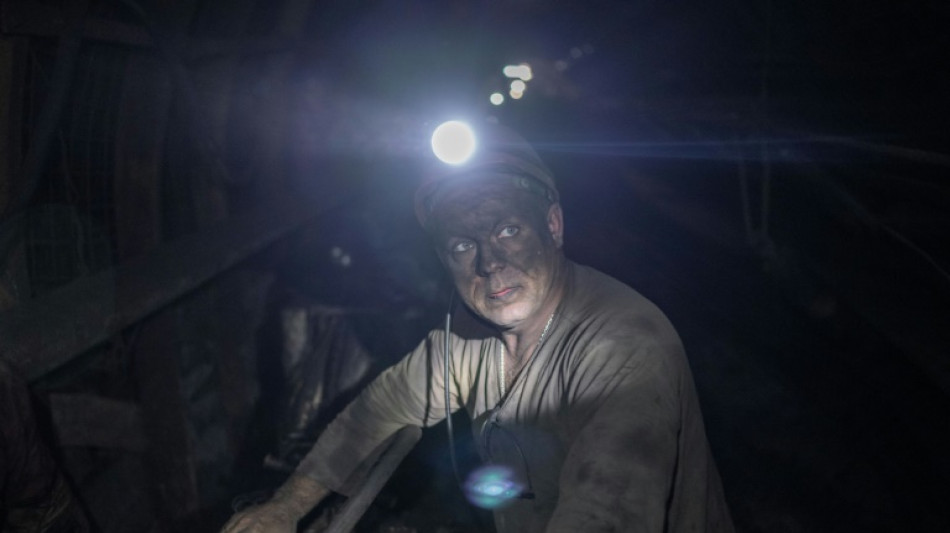 Miners toil for coal beneath the battle for east Ukraine