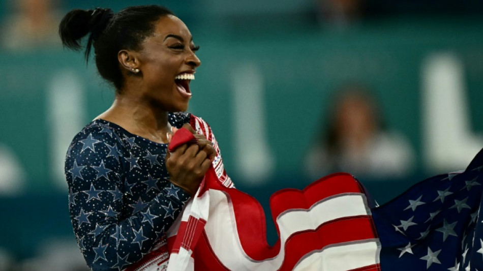 Gymnastique: avec l'or par équipe, Biles réenchante son histoire olympique