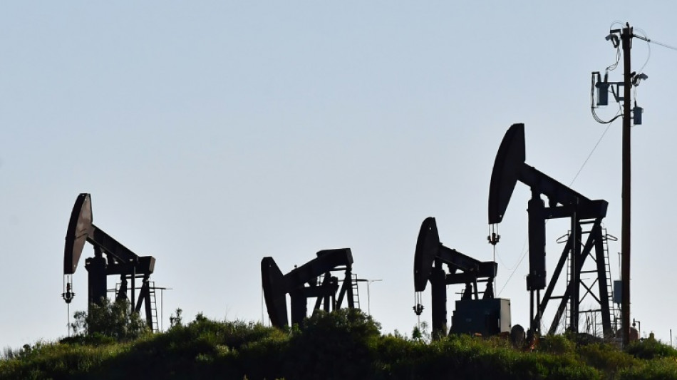 Oil surges, equities mostly fall on growing Ukraine fears