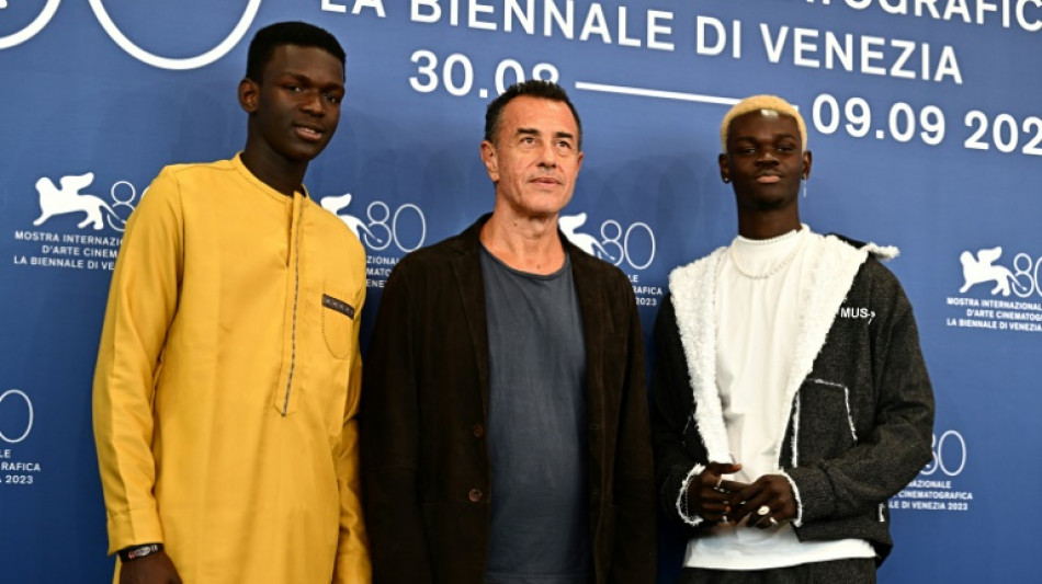 Hard-hitting migrant films tighten Venice race