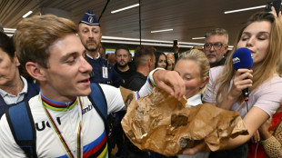 Cyclisme: Evenepoel accuelli en héros à Bruxelles, avant d'autres festivités