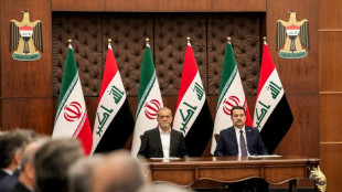 Iran president deepens Iraq ties on first foreign trip