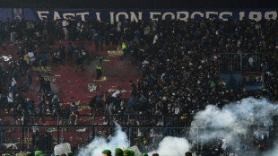 At least 174 dead in Indonesia football stadium stampede