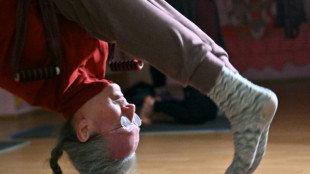 Ukraine's yogis breathe through wartime blackouts