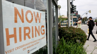 Stock markets waver as US hiring cools 