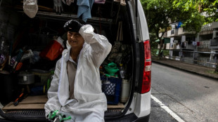 'In a sauna': Hong Kong's labourers swelter as temperatures rise