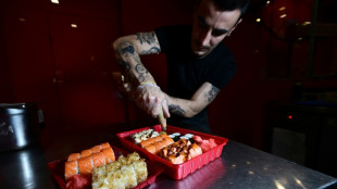 'War is war' but Ukraine sushi bar serves lunch on time