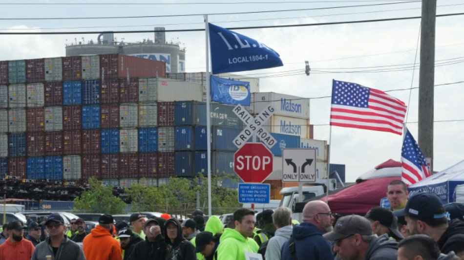 Cranes stand still as US dockworkers fight for 'future'