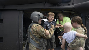 Rescuers face renewed rain as Kentucky flood death toll hits 26