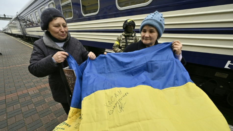 'We're free': Ukraine families reunite as Kherson train station reopens